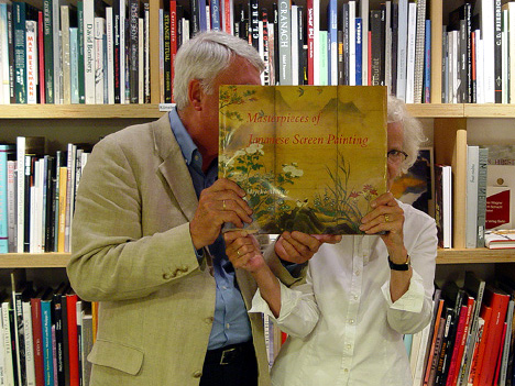 Photo: Mr. and Mrs. Erbe in a world of books